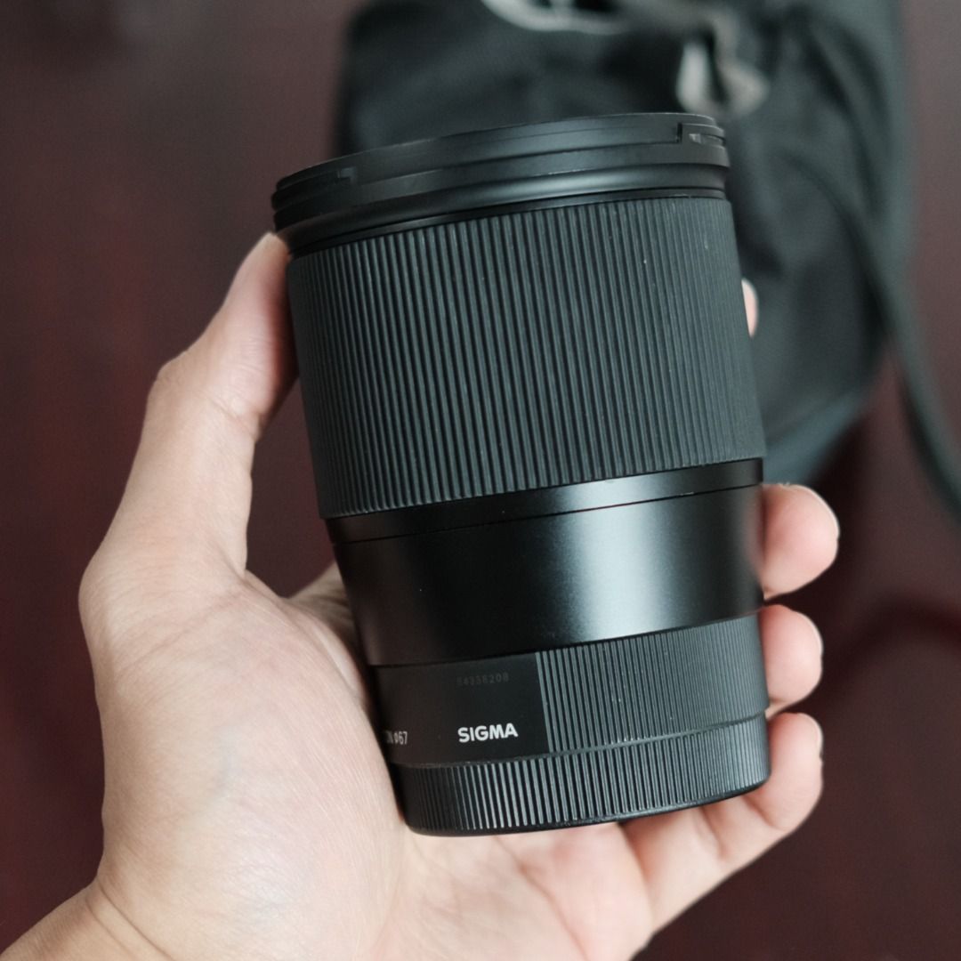 Sigma 16mm f1.4 (Category: Webcams) located in Makati City. Submitted by jmsobrevilla (Listing ID 1432127526, Image 3). Description: Sigma 16mm f1.4 E-Mount Sony This is in good condition. No issues regarding AF performance and clarity. Actual photos are in the post for you to view. It has some signs of use and might need cleaning, but it still works flawlessly. Comes with the front and rear caps, and a lens pouch. Item is located in Makati. Than