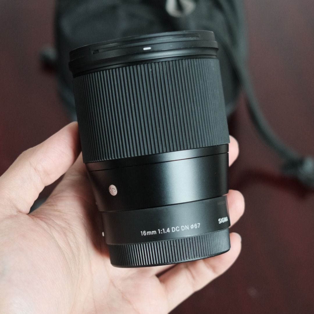 Sigma 16mm f1.4 (Category: Webcams) located in Makati City. Submitted by jmsobrevilla (Listing ID 1432127526, Image 2). Description: Sigma 16mm f1.4 E-Mount Sony This is in good condition. No issues regarding AF performance and clarity. Actual photos are in the post for you to view. It has some signs of use and might need cleaning, but it still works flawlessly. Comes with the front and rear caps, and a lens pouch. Item is located in Makati. Than
