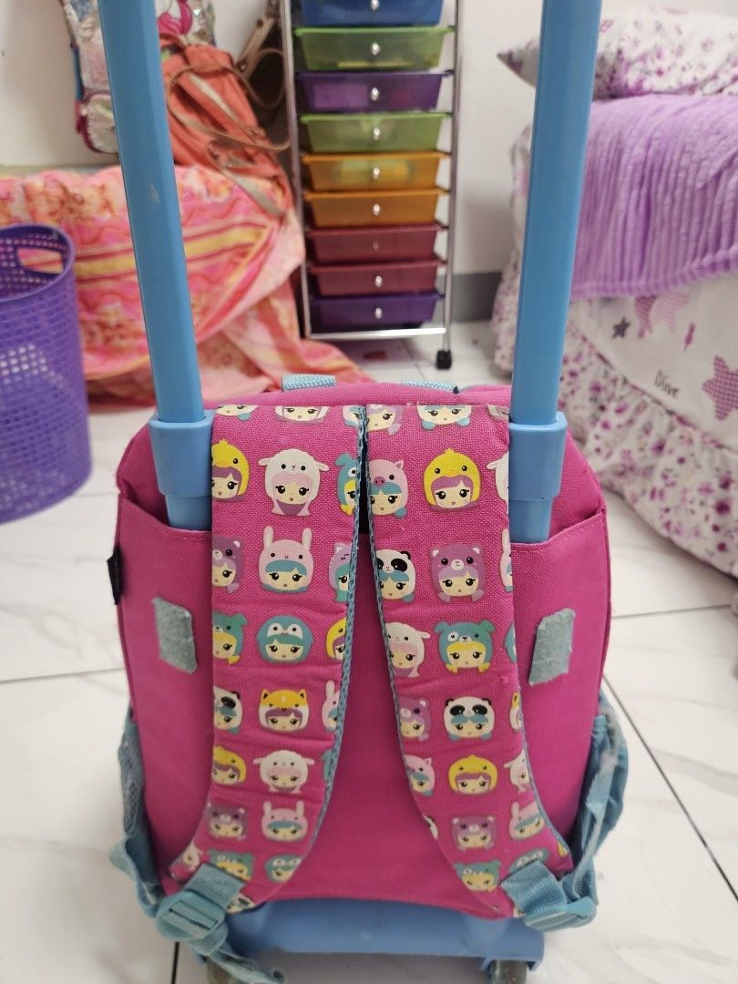 Smiggle Rolling Backpack Trolley (Category: Backpacks) located in Manila. Submitted by cloverclothes (Listing ID 1432188993, Image 2). Description: lightly used. ang ganda p nya pati kulay. fits for kinder-Grade 1 or 2 umiilaw ung gulong. .