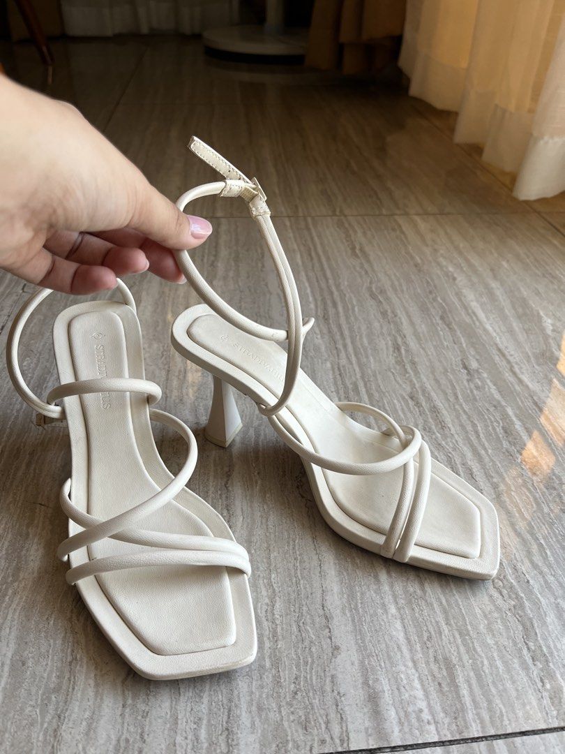 Stradivarius White Strappy Heels (Category: Heels) located in Cavite. Submitted by letsgosab (Listing ID 1432196101, Image 3). Description: - Stradivarius white strappy heels - Square toe design - Delicate ankle strap - Unique curved heel - Comfortable and stylish - Perfect for casual or dressy outfits.