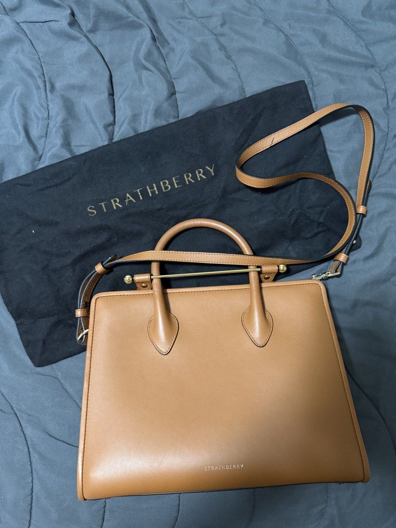 Strathberry bag (Category: Luxury Bags & Wallets) located in Mandaluyong City. Submitted by pam_1026 (Listing ID 1393411295, Image 3). Description: Strathberry midi tote bag in leather chestnut Selling for 45k brand new in Zalora Barely used , Bought in HK .