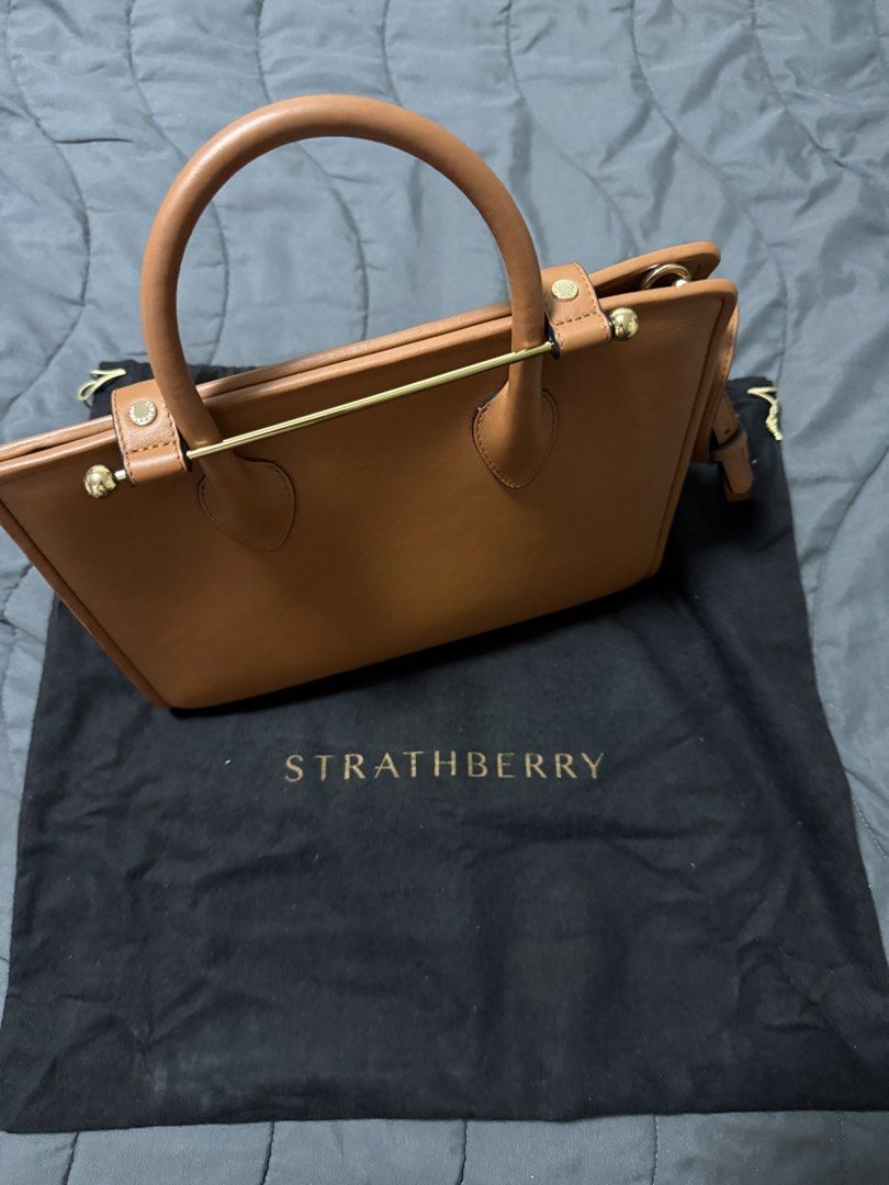 Strathberry bag (Category: Luxury Bags & Wallets) located in Mandaluyong City. Submitted by pam_1026 (Listing ID 1393411295, Image 2). Description: Strathberry midi tote bag in leather chestnut Selling for 45k brand new in Zalora Barely used , Bought in HK .