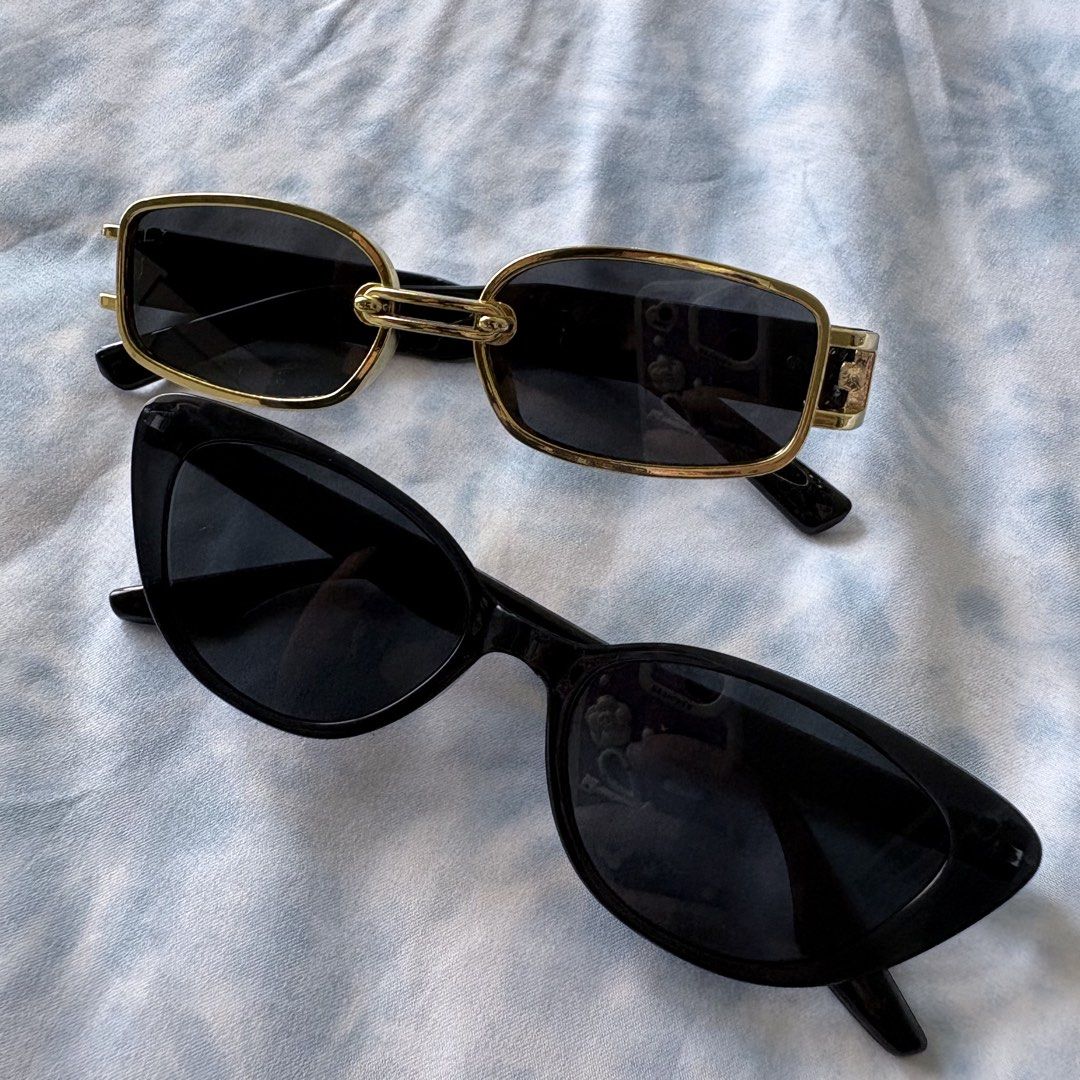 Sunglasses - Gold Frame and Black Cat-Eye (Category: Sunglasses & Eyewear) located in Makati City. Submitted by jinlouise (Listing ID 1432039664, Image 2). Description: - Available: Two stylish sunglasses - 1: Gold frame, rectangular shape - 2: Black cat-eye frame - Features: Dark lenses for sun protection - Benefits: Adds a stylish touch to your look Take 2 for 189.