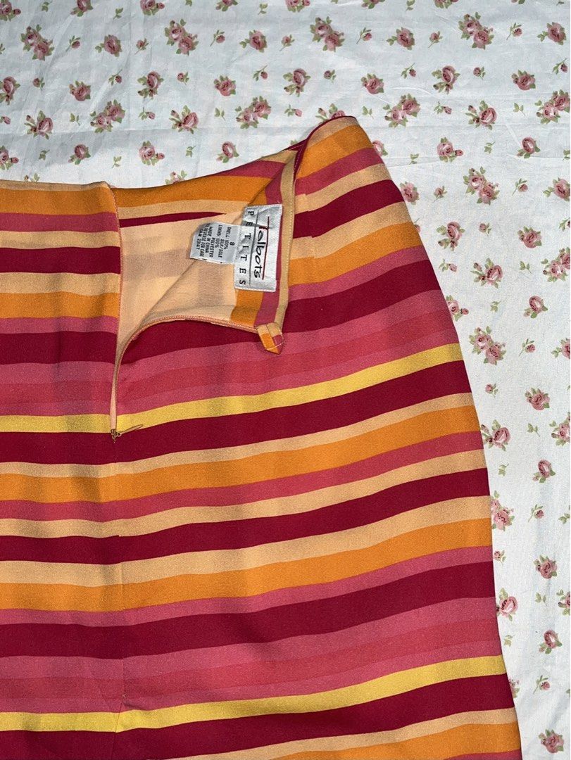 Talbots Striped Skirt (Category: Skirts) located in Pasay City. Submitted by cshell_sells (Listing ID 1432166992, Image 3). Description: - Vibrant striped pattern (red, orange, yellow) - Classic pencil skirt silhouette - Back slit detail - Zipper closure - Brand tag included - Size 8.