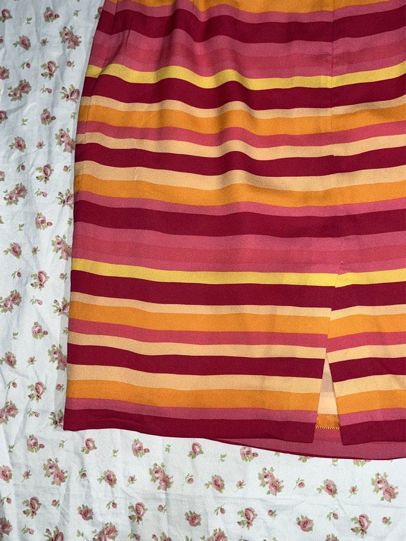 Talbots Striped Skirt (Category: Skirts) located in Pasay City. Submitted by cshell_sells (Listing ID 1432166992, Image 2). Description: - Vibrant striped pattern (red, orange, yellow) - Classic pencil skirt silhouette - Back slit detail - Zipper closure - Brand tag included - Size 8.