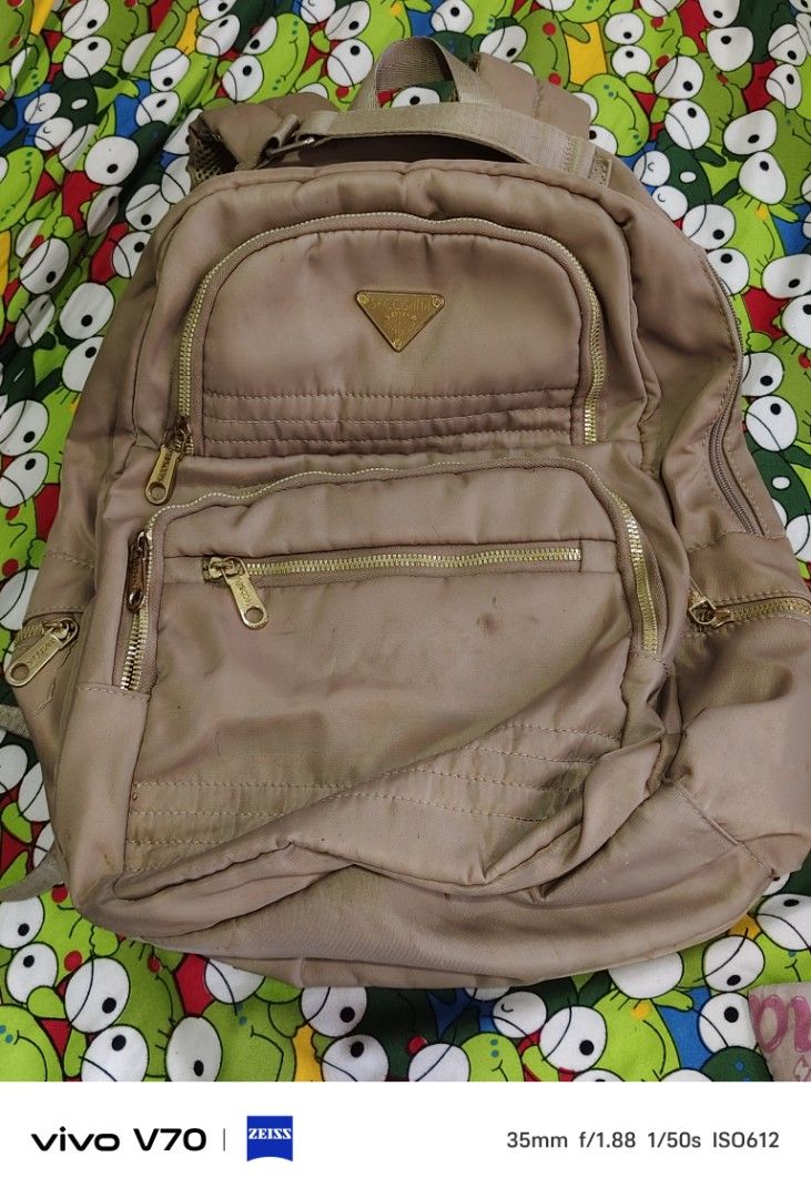 Tan Backpack with Gold Zippers (Category: Backpacks) located in Manila. Submitted by hov_30 (Listing ID 1432124069, Image 1). Description: Price range: 150-350 Pre-loved bags.