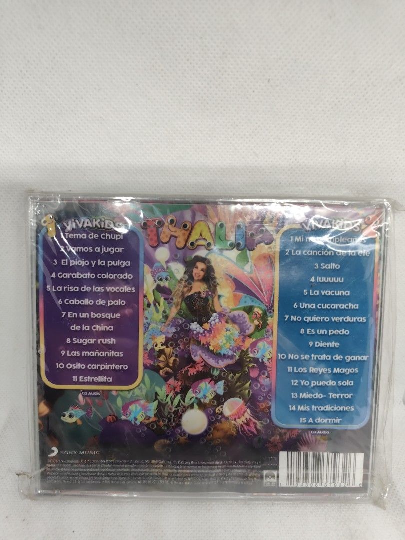THALIA- VIVA KIDS 1&2 (Category: CDs & DVDs) located in Manila. Submitted by musiccdshopnew (Listing ID 1432067228, Image 2). Description: Sealed Viva Kids CD album. Features a variety of children's songs. The tracklist includes songs like "Mi mejor amigo", "La canción de Ariel", "Salto", "Lululu", "Una cucaracha", and more. The CD is still in its original packaging..