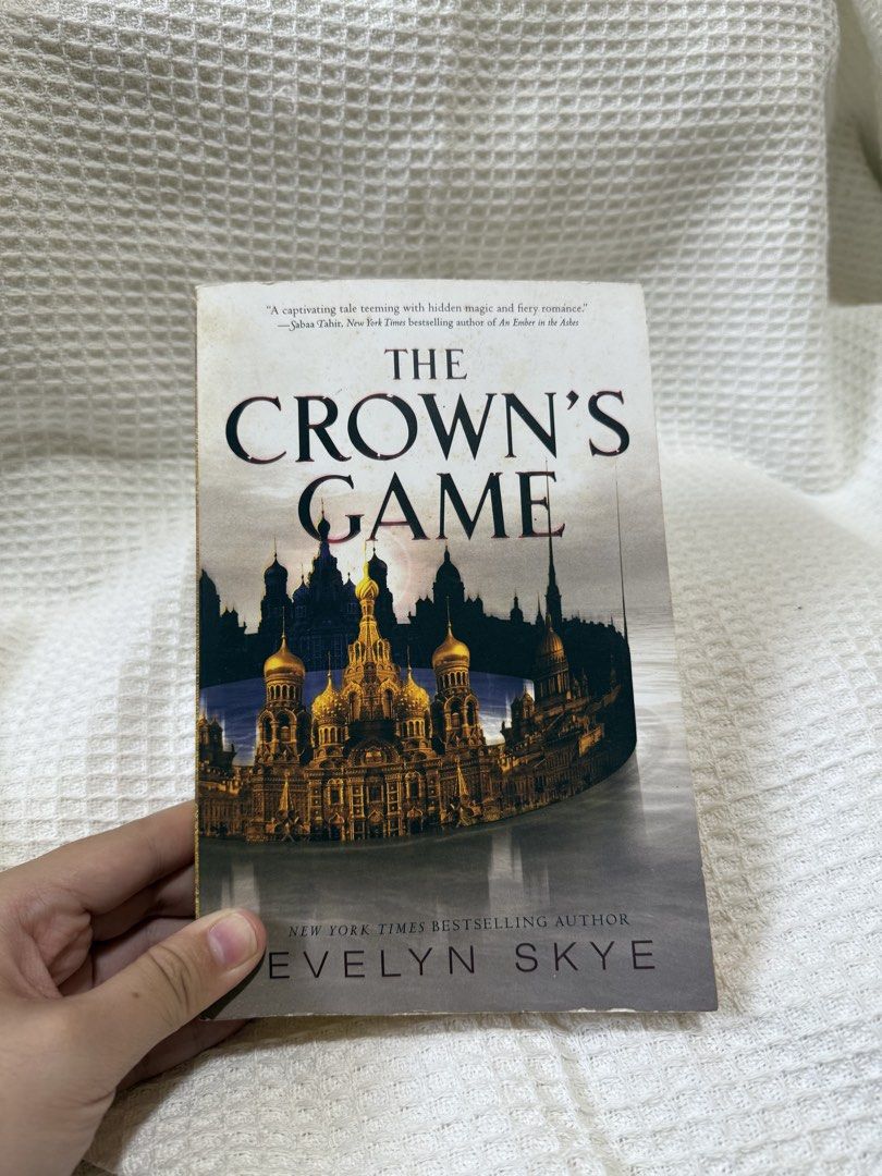 The Crown's Game by Evelyn Skye (Category: Storybooks) located in Las Pinas. Submitted by ioseff (Listing ID 1432000155, Image 1). Description: Preloved Books 🫶 - The Crown's Game by Evelyn Skye - English edition -Edges are yellow - Yellow stains - sign of usage.