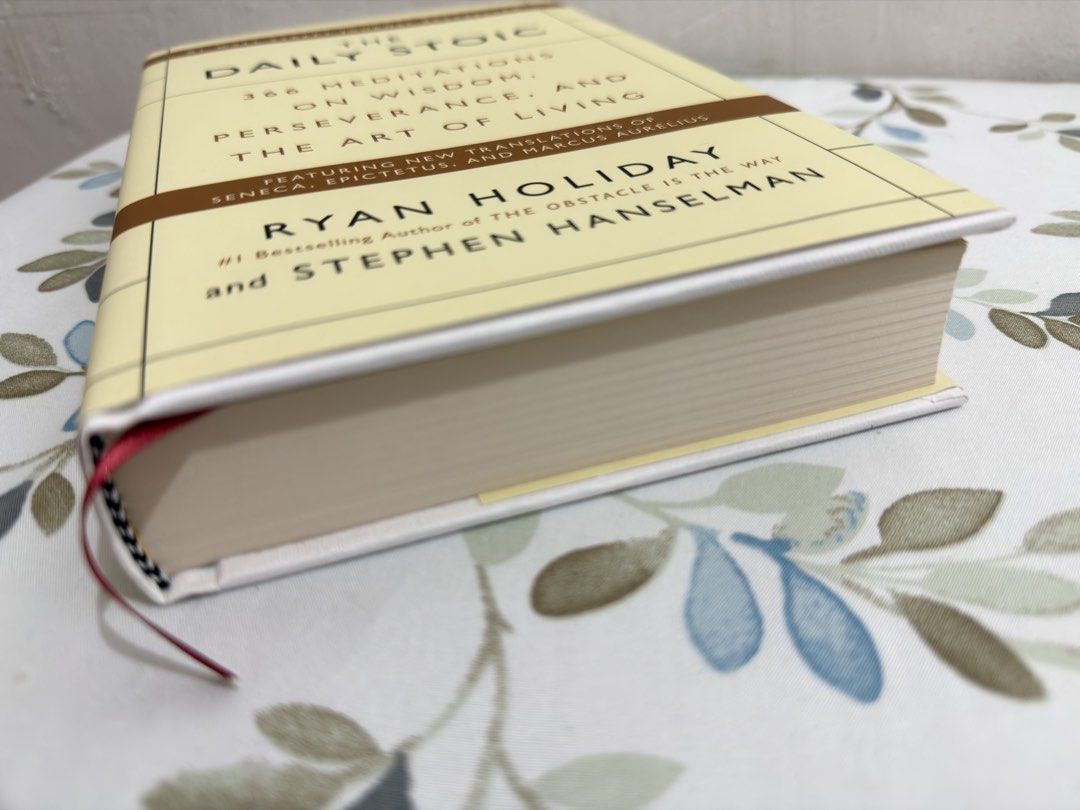 The Daily Stoic by Ryan Holiday (Category: Storybooks) located in Manila. Submitted by fayeshopacc (Listing ID 1432156173, Image 3). Description: - The Daily Stoic by Ryan Holiday and Stephen Hanselman. - Features 366 meditations. - Focuses on wisdom, perseverance, and the art of living. - Includes new translations of Seneca, Epictetus, and Marcus Aurelius. - Comes with a ribbon bookmark. - Pages are clean and the spine is intact..