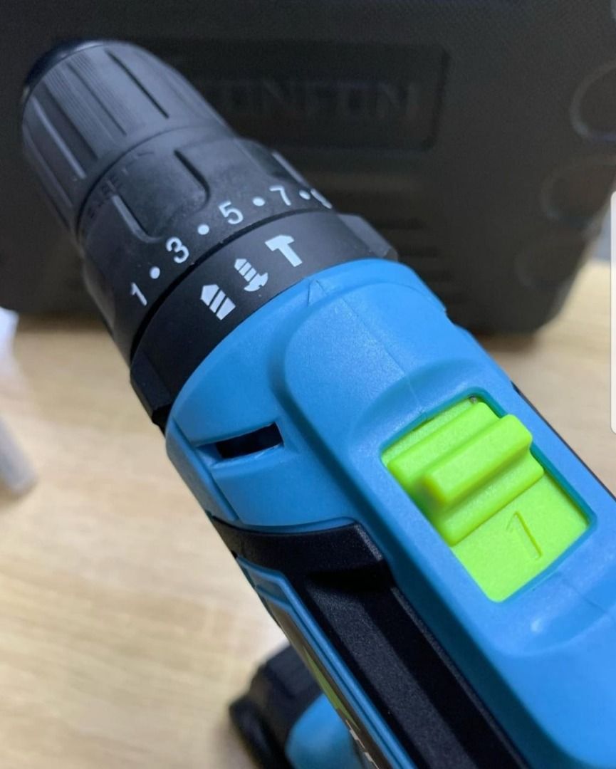Tonfon 12V Cordless Drill with Accessories (Category: Construction Tools & Equipment) located in Caloocan City. Submitted by truehawk.889b68 (Listing ID 1432031363, Image 2). Description: - Tonfon 12V Cordless Drill - Includes drill bits and screwdriver bits - Adjustable torque settings - Forward/Reverse switch - Stylish teal and black design - Green power button - Comes with a carrying case - Battery included.