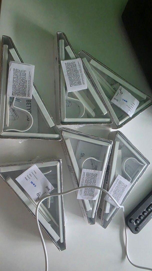 Triangular Picture Frames - New (Category: Other Home Decor) located in Singapore. Submitted by galaxy_toys (Listing ID 1432106334, Image 1). Description: IKEA curtain rope holder 6 for $10.
