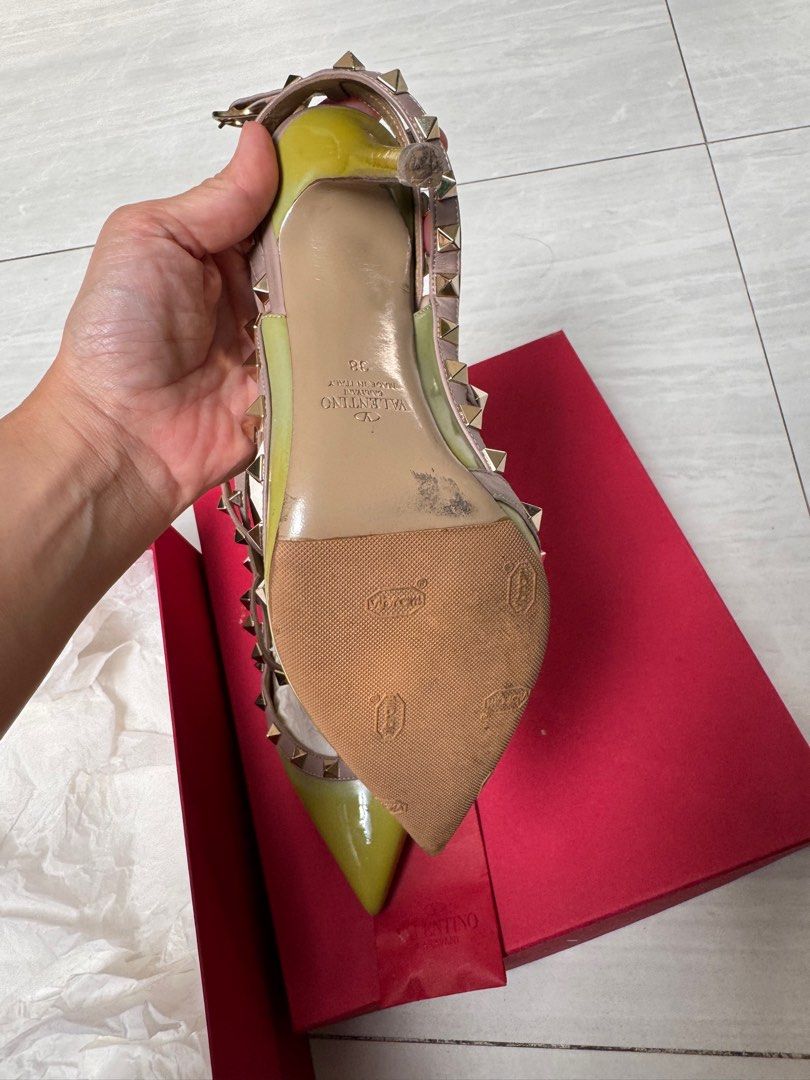 Valentino Garavani Rockstud Heels (Category: Heels) located in Makati City. Submitted by kdl123 (Listing ID 1432169056, Image 2). Description: - Authentic Valentino Garavani Rockstud heels - Size 38 - Stylish design with multiple straps and iconic stud details - Pointed toe - Vibrant color combination - Includes original box and dust bag - Made in Italy - with sole protector - used only a few times.