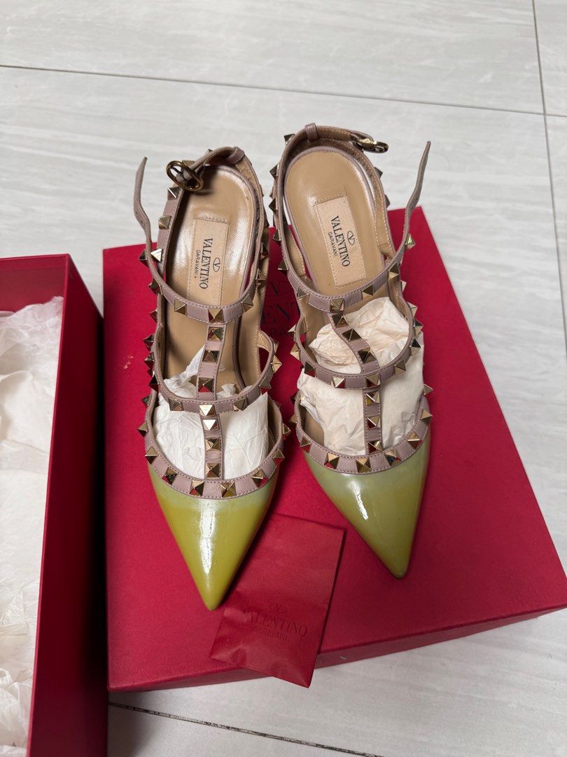 Valentino Garavani Rockstud Heels (Category: Heels) located in Makati City. Submitted by kdl123 (Listing ID 1432169056, Image 1). Description: - Authentic Valentino Garavani Rockstud heels - Size 38 - Stylish design with multiple straps and iconic stud details - Pointed toe - Vibrant color combination - Includes original box and dust bag - Made in Italy - with sole protector - used only a few times.