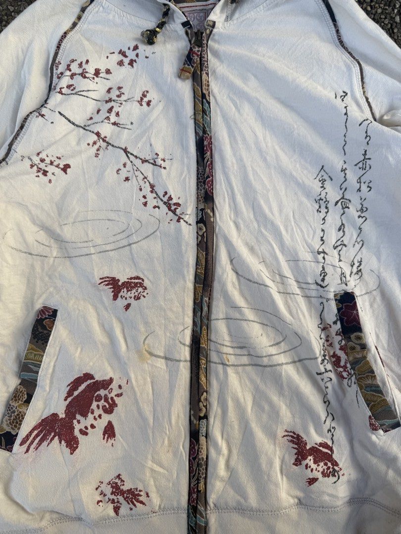 Vintage Oriental Style Graphic Zip-up Hoodie (Category: Coats, Jackets and Outerwear) located in Quezon City. Submitted by though.bare (Listing ID 1432112505, Image 2). Description: Fits on L-XL for Women In worn-out condition. Refer to photos. Width : 20" Length : 26.5" Sleeve : 29" (Neck seam to wrist) Shoulder : N/A No-when worns. Listings not marked sold/reserved are available. These are preloved/used items, manage expectations. Visit my prof