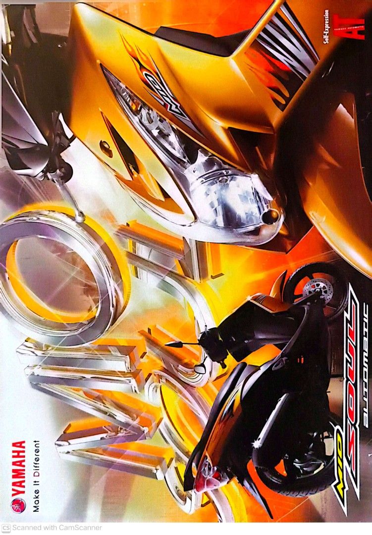 Yamaha Mio Soul Automatic Motorcycle (Category: Motorbikes for Sale) located in Calamba. Submitted by mightyhawk_413545 (Listing ID 1432136379, Image 2). Description: Gold Yamaha Mio Soul automatic motorcycle. Features a black seat and black wheels. Includes a license plate. The motorcycle has a gold and black color scheme. The images show the front, side, and rear views of the motorcycle..