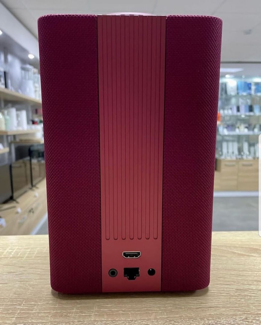 Yandex Smart Speaker (Category: Soundbars, Speakers & Amplifiers) located in Caloocan City. Submitted by truehawk.889b68 (Listing ID 1432034901, Image 2). Description: - Pink smart speaker - Features HDMI port - Includes Ethernet port - Has audio input - Top control buttons - Compact size.