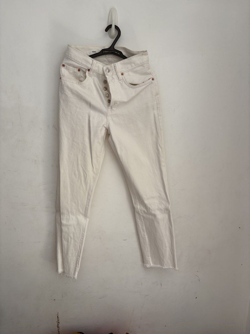 2 pairs preloved White Denim Jeans (Category: Jeans) located in Quezon City. Submitted by brandedthingsforless (Listing ID 1432213757, Image 3). Description: - High-waisted white denim jeans - Button fly closure - Straight leg cut - Raw hem detail - Classic five-pocket design - Medium-weight denim Both will fit 23-24 waist Decluttering Mango and Uniqlo brand As is , no when worn photos Sf to be shouldered by buyers .