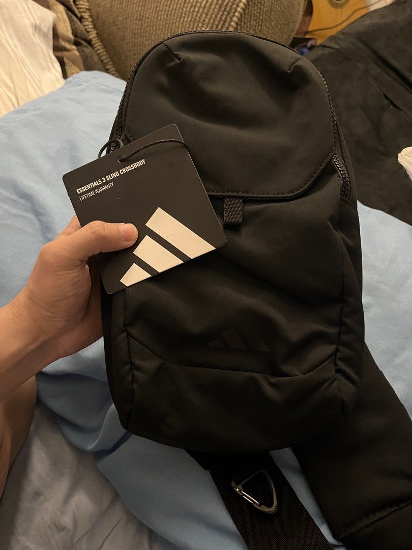 Adidas Essentials 3 Sling Crossbody Bag (Category: Sling Bags) located in Manila. Submitted by chad.chad4 (Listing ID 1432203313, Image 1). Description: - AUTHENTIC Adidas Essentials 3 Sling Crossbody Bag (Black) - Main compartment with zip closure - Front flap pocket - Adjustable shoulder strap - Adidas logo on front PM FOR MORE DEETS .