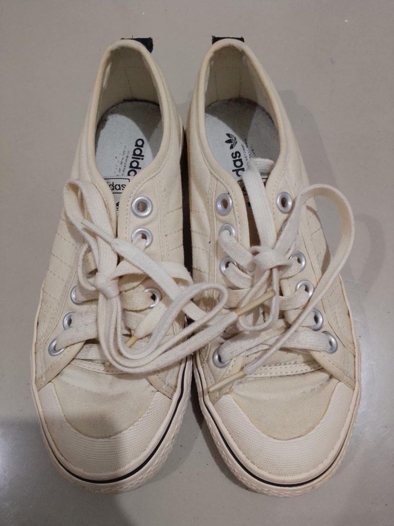 Adidas Nizza Low Top Sneakers (Category: Sneakers) located in Manila. Submitted by usbrandedcollections (Listing ID 1432202656, Image 1). Description: Onhand ready to ship! Lahat Original Expected minor flaws / stain ❌ NO Refund, swap, return & exchange Color may vary due to lightning - Adidas Nizza low-top sneakers - Adidas logo on tongue and insole - Lace-up closure - Rubber sole - Signs of wear on canvas upper and sole - Metal eyelets.