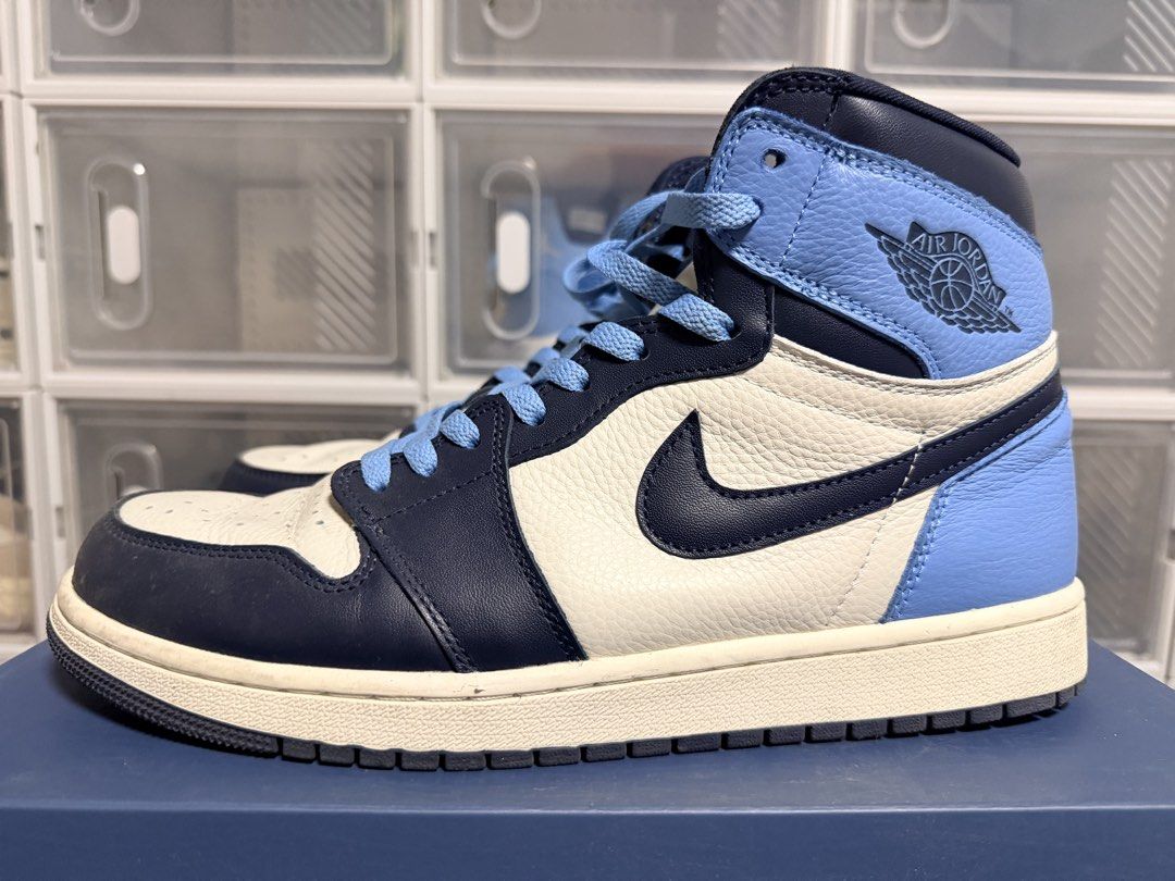 Air Jordan 1 High Obsidian (Category: Sneakers) located in Quezon City. Submitted by 30somethingtreasures (Listing ID 1432253868, Image 1). Description: - Air Jordan 1 High OG - University Blue colorway - White base - Navy blue overlays - Light blue collar - Navy blue soles - Light blue laces - Nike swoosh on sides - Air Jordan wings logo.