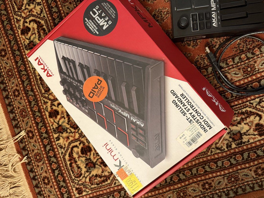 Akai MPK Mini Special Edition Black (Category: Musical Instruments) located in Subic. Submitted by tricialgr (Listing ID 1432356404, Image 3). Description: Bought in USA Price is negotiable - Akai MPK Mini Special Edition Black MIDI controller - Includes original box and USB cable - Features keys, pads, and knobs - Perfect for music production and creating beats/melodies - Compact and portable design - Suitable for all skill levels.