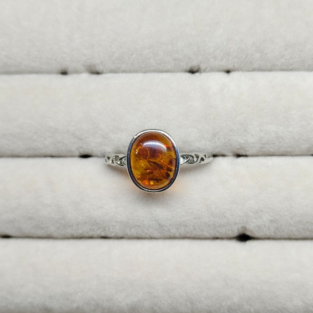 Amber Adjustable Ring (Category: Rings) located in Bayan Lepas. Submitted by chubbycattail (Listing ID 1432232029, Image 1). Description: Silver-plated ring .