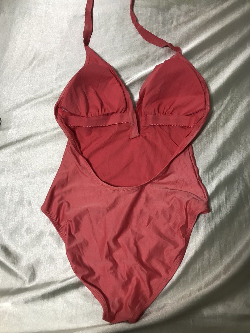 Brand New Halter Swimsuit (Category: Bikinis & Swimsuits) located in Valenzuela. Submitted by jam0816 (Listing ID 1432198032, Image 3). Description: ✅ BRAND NEW!! 👙 Fits M to L 🩷 with padding - coral halter swimsuit - Gold lettering with rhinestones and studs - Deep V-neckline - Low back - Light pink lining - Halter straps tie at the back.