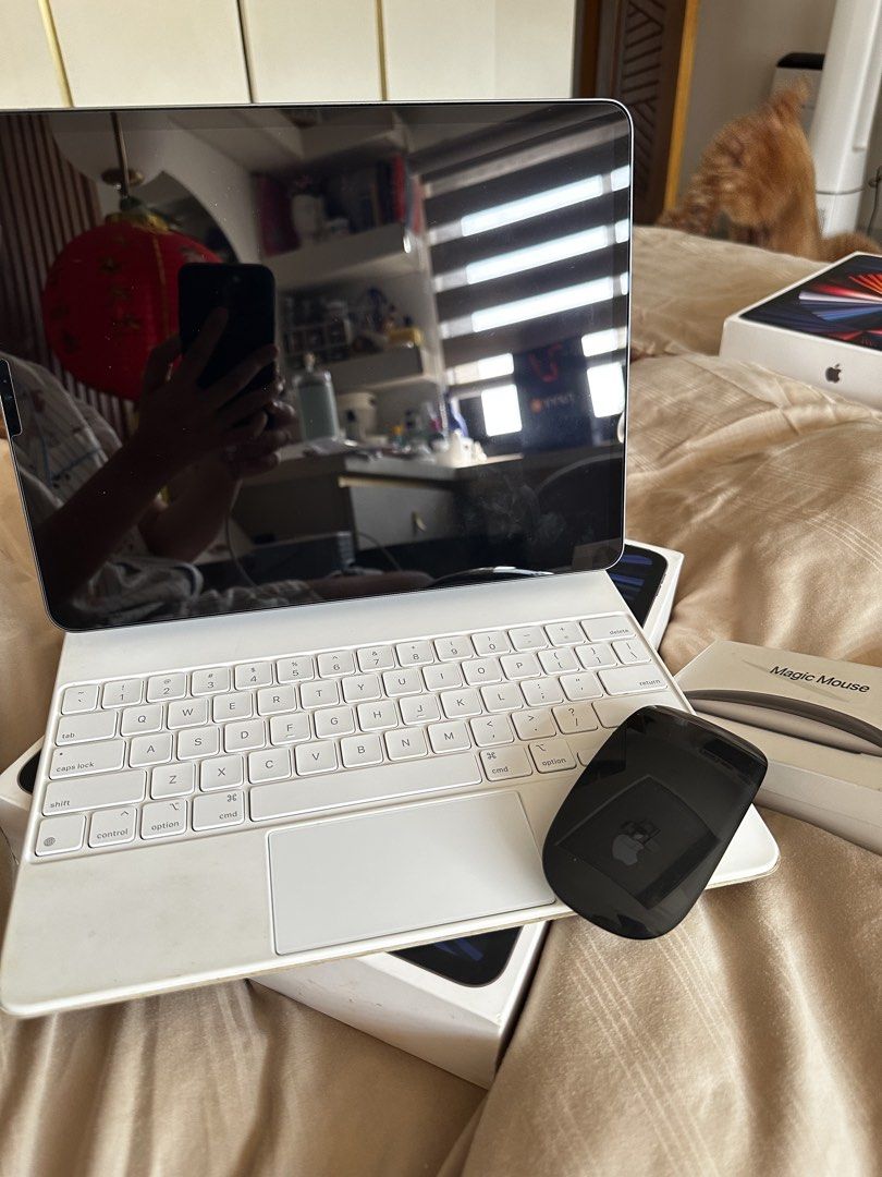 Apple iPad Pro 5th Gen with Magic Keyboard and Mouse (Category: iPad) located in Ilagan. Submitted by whiskyandeevie (Listing ID 1432366354, Image 1). Description: Ipad Pro 5th Generation 12.9-inch Wi-Fi Metallic Gray Color 256 gb space Minor line scratches and small dent on one side (Pero hindi halata) Condition: 8.5/10 No issue with the ipad itself (I will update it to its latest version bago ibigay) Great for studying or for work since may key