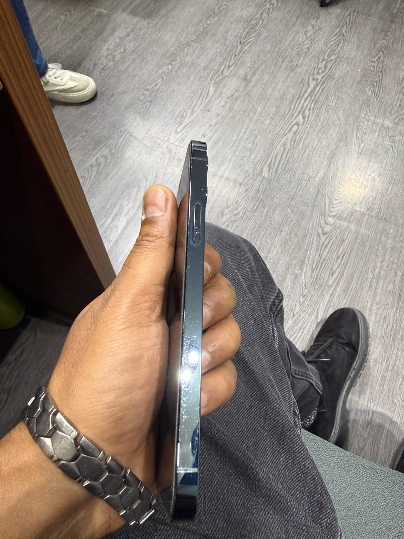 (Category: iPhone 12 Series) located in Singapore. Submitted by dannyspark359 (Listing ID 1432270740, Image 2). Description: - iPhone 12 Pro in Pacific Blue - Fully functional - Phone only with box - Please view photos for condition camera Face ID all working great .