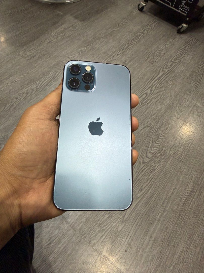 (Category: iPhone 12 Series) located in Singapore. Submitted by dannyspark359 (Listing ID 1432270740, Image 3). Description: - iPhone 12 Pro in Pacific Blue - Fully functional - Phone only with box - Please view photos for condition camera Face ID all working great .