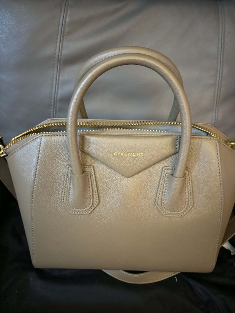 Authentic Givenchy Antigona Medium Natural Beige (Category: Luxury Bags & Wallets) located in Pasig City. Submitted by kazuesan7741 (Listing ID 1432254819, Image 1). Description: This bag is the Givenchy Antigona, a classic luxury handbag known for its structured, trapezoid silhouette and signature triangular logo patch. With orignal Givenchy dust bag also include a detachable shoulder strap, a care booklet, a leather swatch. No issues whatsoever