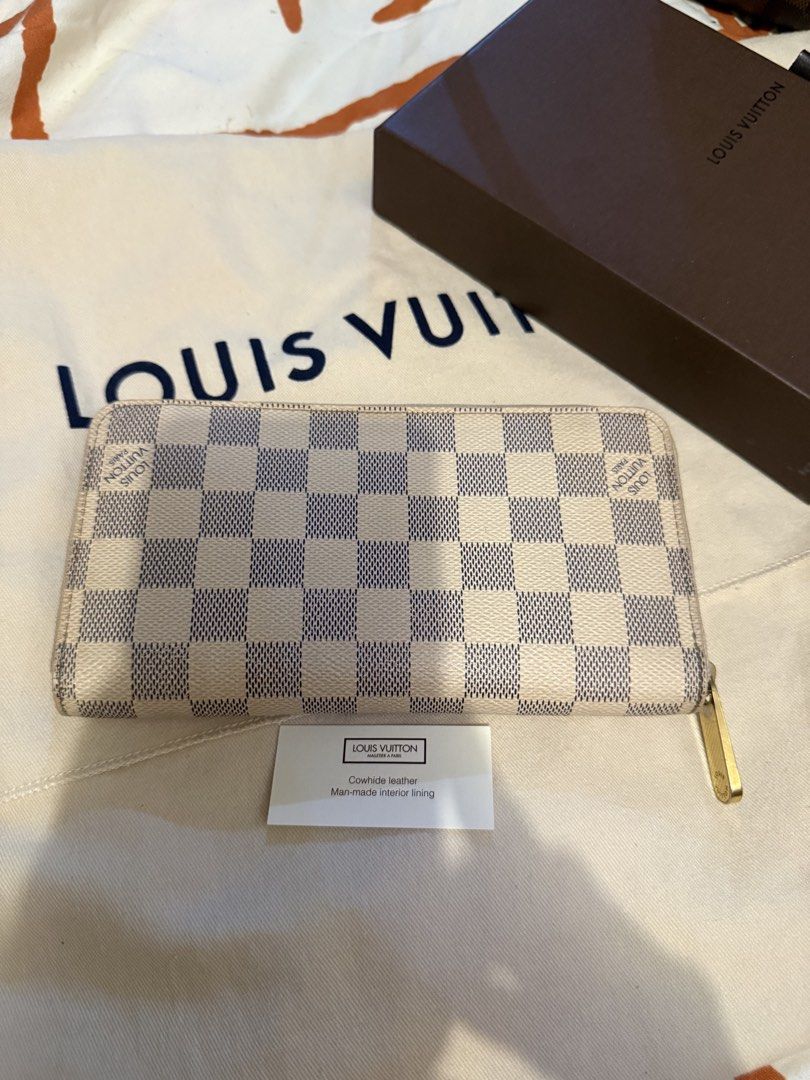 Authentic Louis Vuitton Damier Azur Zippy Wallet (Category: Luxury Bags & Wallets) located in Angeles City. Submitted by luxuresbagsandaccessories (Listing ID 1432357062, Image 1). Description: Lv azur zippy wallet With box and paper bag Guaranteed authentic .
