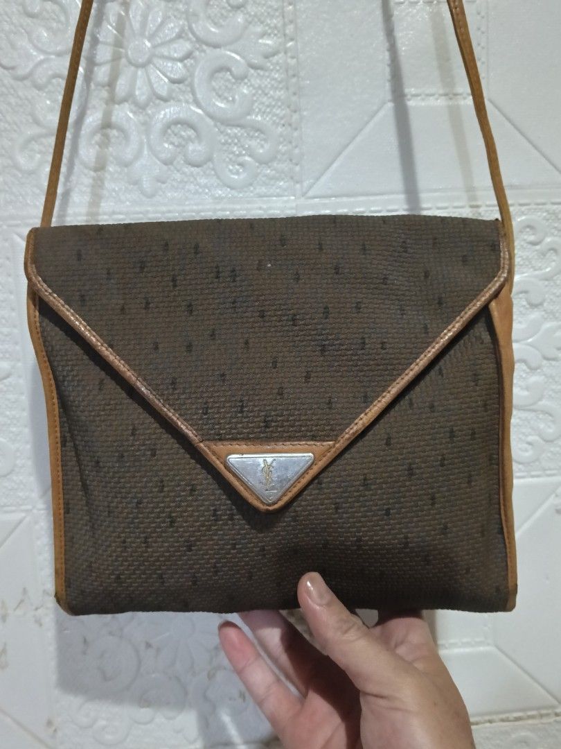 Authentic Vintage YSL Envelope Crossbody Bag (Category: Luxury Bags & Wallets) located in Manila. Submitted by archie_doroy (Listing ID 1432337396, Image 3). Description: Authentic/Legit 💯 Vintage YSL Envelope Crossbody Bag 7/10 Condition Issue check Nyo nlng sa picture. Rubs sa mga corner. 750 Freeship only.
