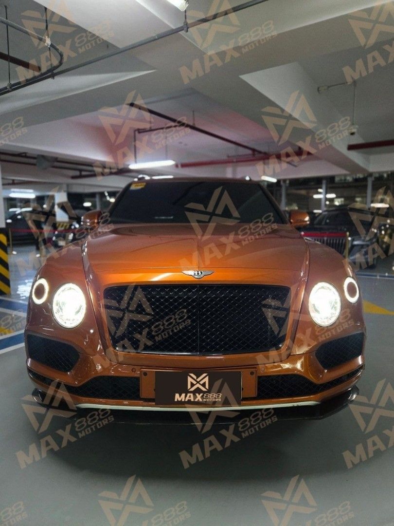 Bentley Bentayga Carbon Package Auto (Category: Used Cars) located in Makati City. Submitted by Max888 (Listing ID 1432260597, Image 1). Description: 2020 Top-of-the-line Bentley Bentayga Carbon Pack - Local dealership released with Optional specs up to 30m+ - Flame Orange exterior with grey and white leather interior, orange stitching and embroidered headrests - The 4.0tt V8 engine roars to life, the same as the Urus and Cayenne Turbo. - Origina