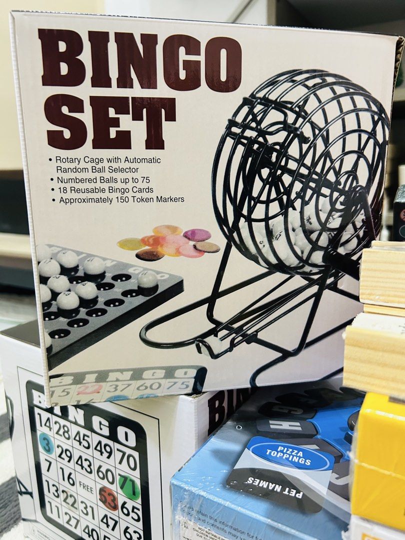 Bingo Set with Rotary Cage (Category: Board Games & Puzzles) located in Quezon City. Submitted by playboxph (Listing ID 1432209828, Image 2). Description: - Rotary cage with automatic random ball selector - Numbered balls up to 75 - 18 reusable bingo cards - Approximately 150 token markers - Great for family and friend game nights!.