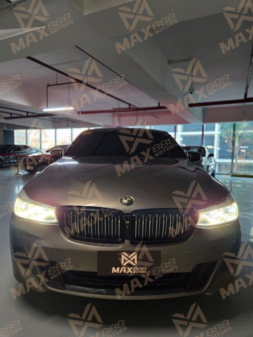 BMW GT 630D 6 series Auto (Category: Used Cars) located in Makati City. Submitted by Max888 (Listing ID 1432246607, Image 1). Description: 2020 BMW 620GT Xdrive - Champagne gold genuine leather interior with white trim, frameless doors - 3.0TT inline six-cylinder diesel engine, full-time four-wheel drive - Full LCD instrument cluster with latest generation iDrive system - Adaptive air suspension, Active grille shutters, electric ducktail spoiler 