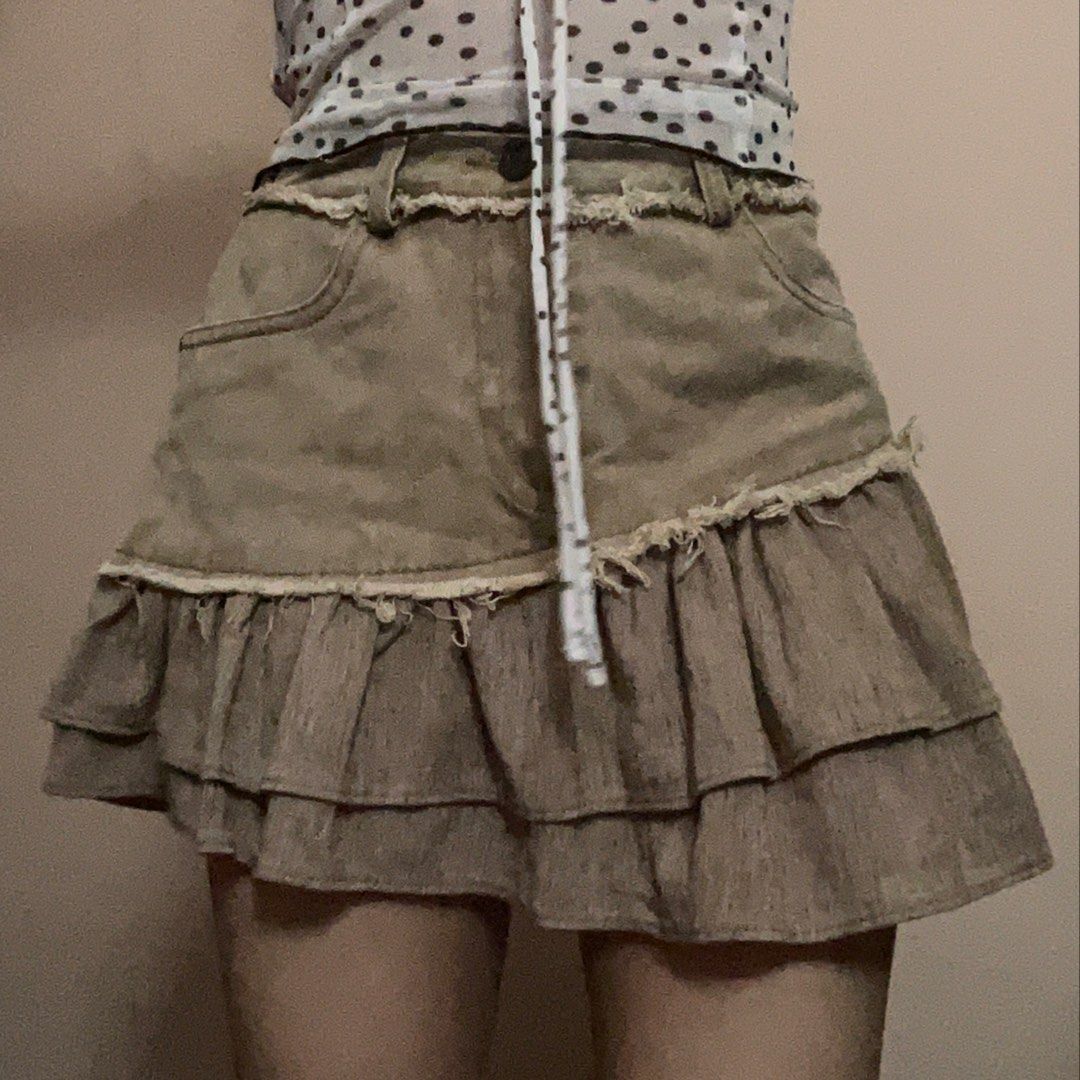 brown asymmetrical denim skirt (Category: Skirts) located in General Trias. Submitted by misasells (Listing ID 1432356486, Image 1). Description: waist: 26” length: 13”.