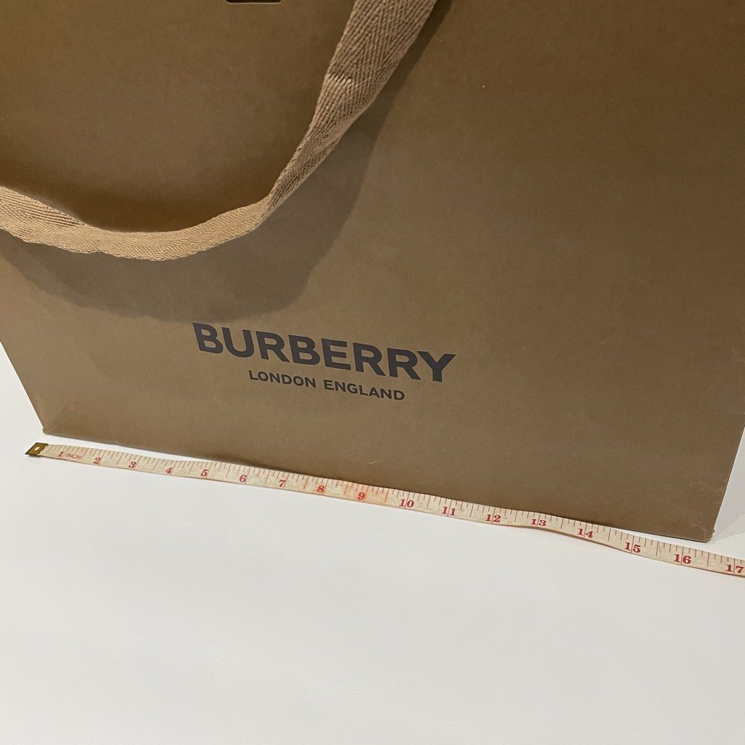Burberry Authentic Large Paper Bag (Category: Luxury Bags & Wallets) located in Cavite. Submitted by kyukyuchan (Listing ID 1432197975, Image 2). Description: ✨50+ ITEMS ON MY PAGE LISTING✨ [Notes: SOME ITEMS ARE FROM BALIKBAYAN BOX, THUS, BOX OR PLASTIC PACKAGINGS ARE REMOVED] Notes: - Dimensions are already included in photos. - Add ₱99 for ribbon - What You See Is What You Get - No Flaws, Unless Stated. 🚫WE WILL NOT BE LIABLE FOR ANY DAMAGES 
