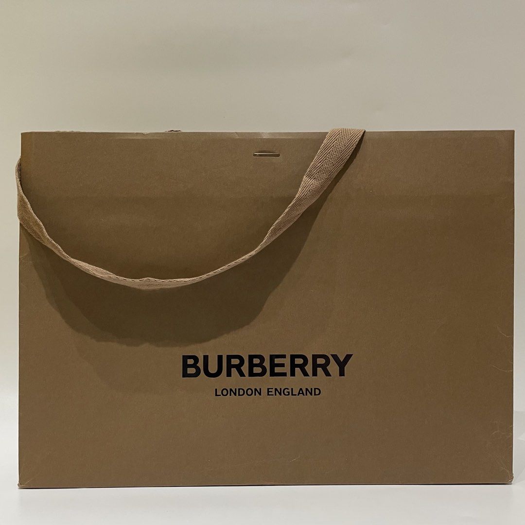 Burberry Authentic Large Paper Bag (Category: Luxury Bags & Wallets) located in Cavite. Submitted by kyukyuchan (Listing ID 1432197975, Image 1). Description: ✨50+ ITEMS ON MY PAGE LISTING✨ [Notes: SOME ITEMS ARE FROM BALIKBAYAN BOX, THUS, BOX OR PLASTIC PACKAGINGS ARE REMOVED] Notes: - Dimensions are already included in photos. - Add ₱99 for ribbon - What You See Is What You Get - No Flaws, Unless Stated. 🚫WE WILL NOT BE LIABLE FOR ANY DAMAGES 