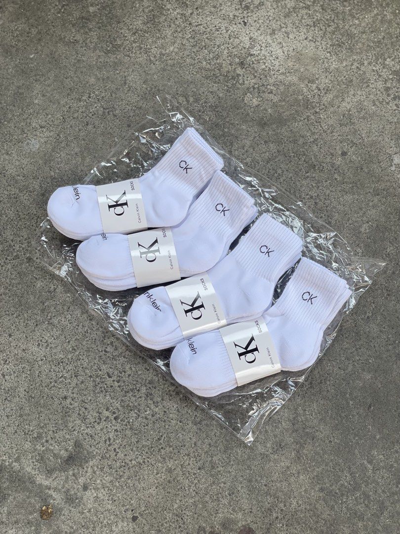 Calvin Klein White Socks (Category: Socks) located in Manila. Submitted by vensen1798495 (Listing ID 1432216350, Image 1). Description: - Brand new white Calvin Klein socks. - Features the iconic "CK" logo embroidered on the cuff. - Comes in original clear plastic packaging. - Made in China. - Material: 98% polyester, 2% spandex. 1bundle 3pairs 200 Pesos Tondo manila.