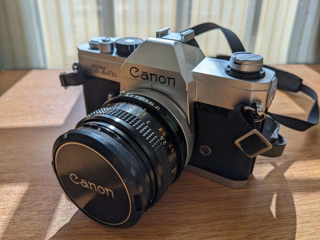 Canon TLB Film Camera (Category: Cameras) located in Manila. Submitted by sa_bahay (Listing ID 1432298746, Image 1). Description: Canon TLB Film Camera -comes with FD 50mm 1.8 lens and oiginal strap -no issues, all speeds working -lens is clean, no fungus, no haze -some dust in the viewfinder (see 4th photo) Loc: San Rafael, Bulacan Can ship via lalamove/LBC SF shouldered by the buyer.