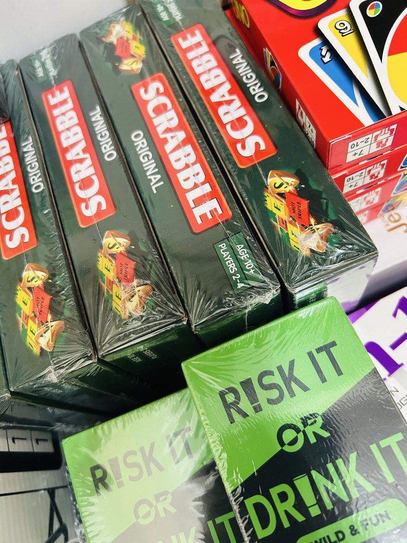 Cards Against Humanity, Scrabble, Risk It, Uno (Category: Board Games & Puzzles) located in Quezon City. Submitted by playboxph (Listing ID 1432209807, Image 2). Description: Various board games available. Includes Cards Against Humanity, Scrabble, Risk It or Drink It, Uno, and more. Some games are designed for adults, while others are suitable for families. Perfect for game nights and gatherings. All games appear to be sealed and ready to play..