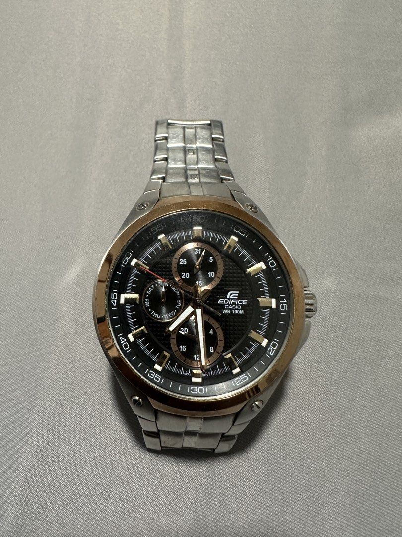 Casio Edifice EF-326D-1AV Watch (Category: Men's Watches) located in Baguio. Submitted by aviathriftauthentifinds (Listing ID 1432390134, Image 3). Description: - Casio Edifice EF-326D-1AV - Stainless steel case - Black dial with rose gold accents - Three hands (hours, minutes, seconds) - Day and 24-hour subdials - Battery life: Approximately 2 years - Case size: 49.5 x 45.0 x 11.5 mm - Weight: 157g.