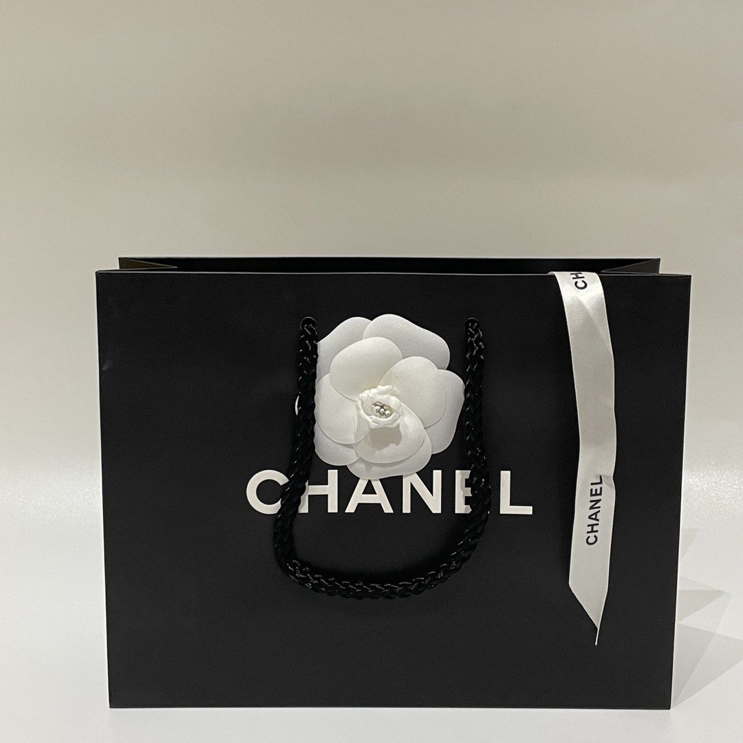 Chanel Authentic Small Black Paper Bag (Category: Luxury Bags & Wallets) located in Cavite. Submitted by kyukyuchan (Listing ID 1432199148, Image 1). Description: ✨50+ ITEMS ON MY PAGE LISTING✨ [Notes: SOME ITEMS ARE FROM BALIKBAYAN BOX, THUS, BOX OR PLASTIC PACKAGINGS ARE REMOVED] Notes: - Dimensions are already included in photos. - Add ₱99 for ribbon - What You See Is What You Get - No Flaws, Unless Stated. 🚫WE WILL NOT BE LIABLE FOR ANY DAMA