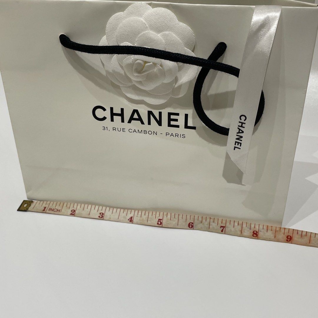 Chanel Authentic Small Paper Bag (Category: Luxury Bags & Wallets) located in Cavite. Submitted by kyukyuchan (Listing ID 1432199013, Image 2). Description: ✨50+ ITEMS ON MY PAGE LISTING✨ [Notes: SOME ITEMS ARE FROM BALIKBAYAN BOX, THUS, BOX OR PLASTIC PACKAGINGS ARE REMOVED] Notes: - Dimensions are already included in photos. - Add ₱99 for ribbon - What You See Is What You Get - No Flaws, Unless Stated. 🚫WE WILL NOT BE LIABLE FOR ANY DAMAGES TH