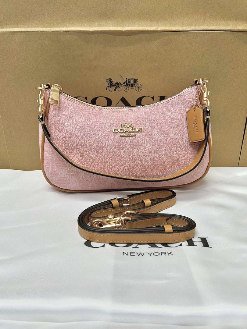 Coach Teri 24cm (Category: Luxury Bags & Wallets) located in Bulacan. Submitted by mykakarizza (Listing ID 1432304065, Image 2). Description: PINK IS PINKING TALAGA!!😍💖 ₱1600 only Teri 24cm Complete inclusions paperbag + dustbag + cards 📸 Actual pics! 🙋🏻‍♀️.