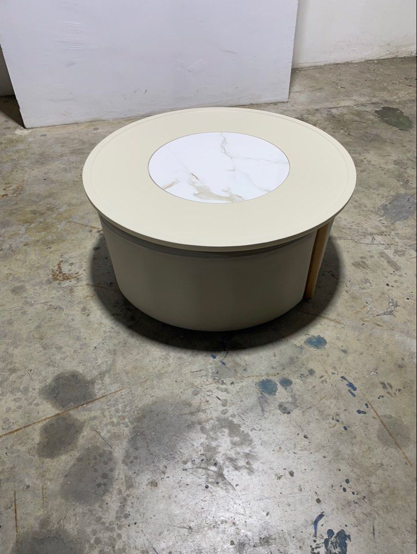 Coffee table (Category: Tables & Sets) located in Singapore. Submitted by oneseasons (Listing ID 1432215828, Image 2). Description: Coffee table,MDF board,the top of the table small circular is stone material,solid wood legs,leather material stools,the diameter is 85cm,free delivery service..