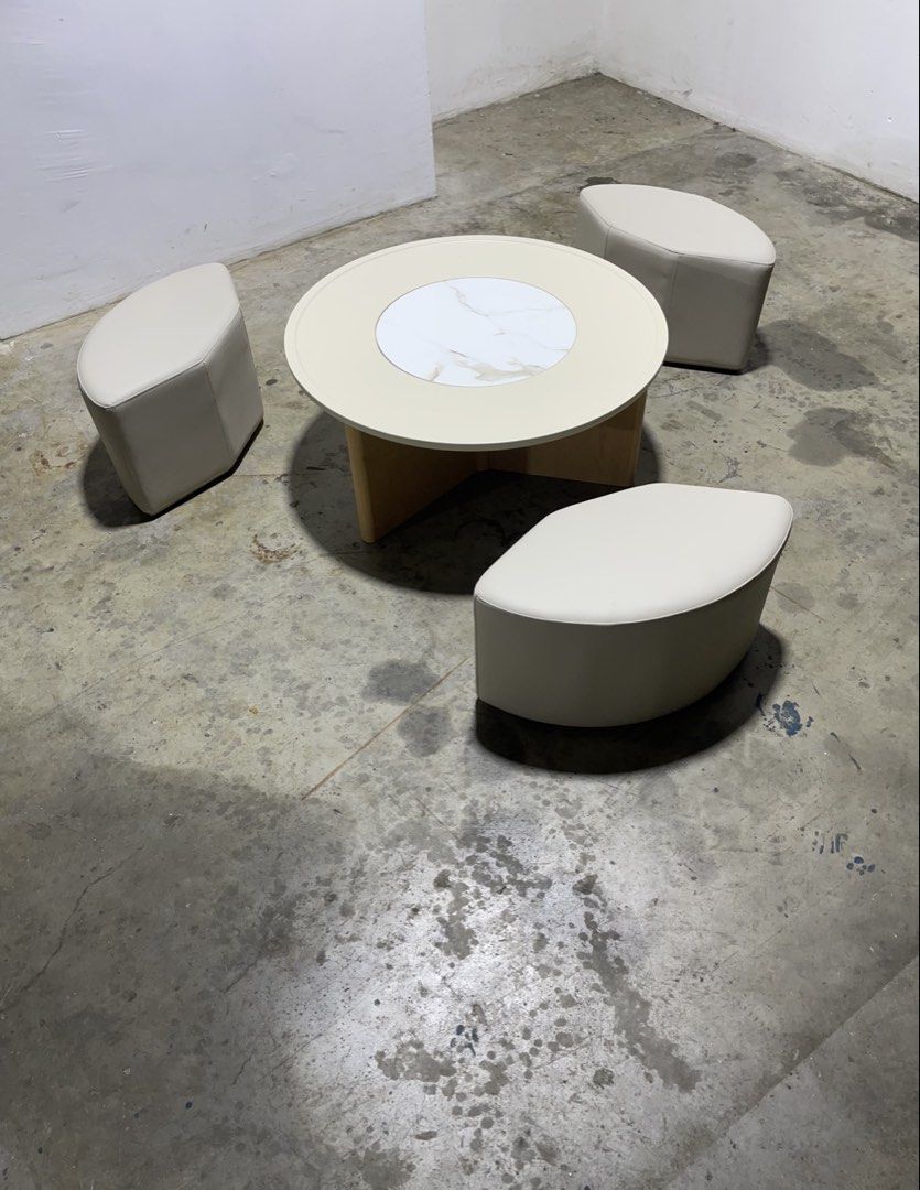 Coffee table (Category: Tables & Sets) located in Singapore. Submitted by oneseasons (Listing ID 1432215828, Image 3). Description: Coffee table,MDF board,the top of the table small circular is stone material,solid wood legs,leather material stools,the diameter is 85cm,free delivery service..