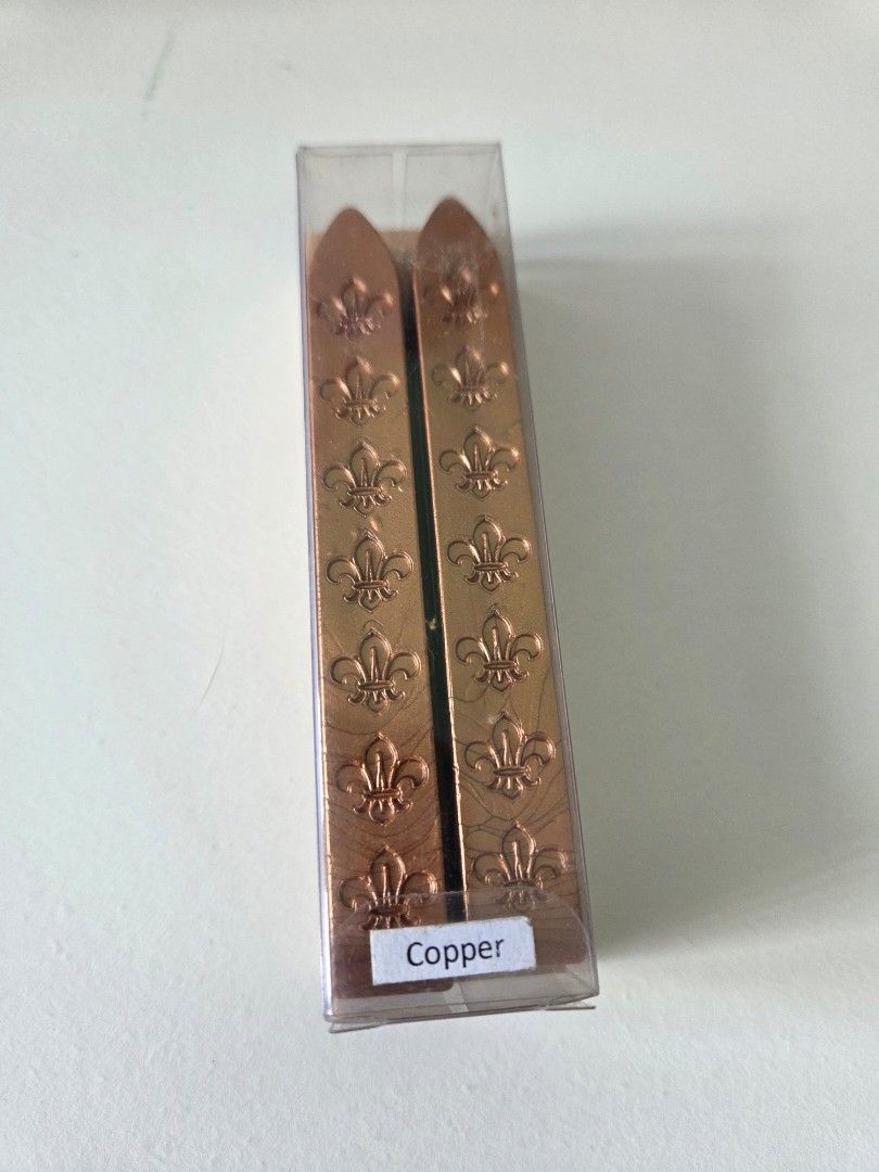 Copper Fleur-de-lis Sealing Wax Sticks (Category: Craft Supplies & Tools) located in Manila. Submitted by iamalody (Listing ID 1432389742, Image 2). Description: - Copper sealing wax sticks - Fleur-de-lis design - Each stick in a clear plastic box - Color: Copper - Ideal for letters, invitations, and crafts TAKE ALL FOR 400PHP.