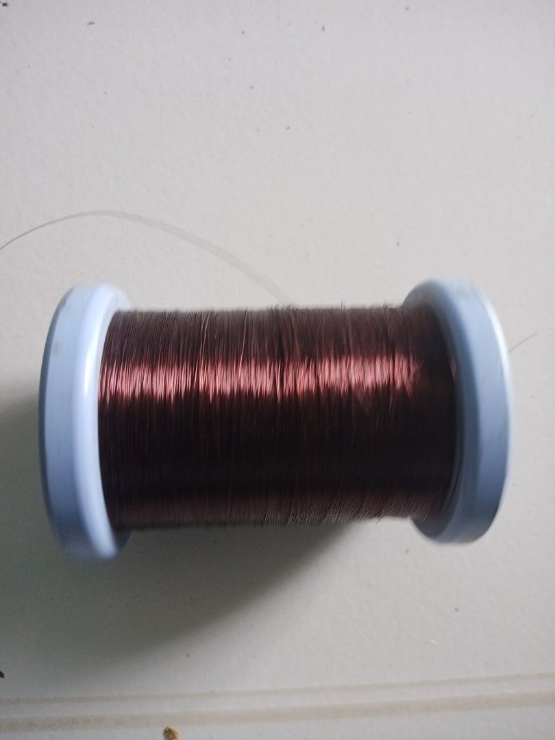 Copper Wire Thread Spool (Category: Craft Supplies & Tools) located in Singapore. Submitted by beyondkeys07986 (Listing ID 1432223591, Image 6). Description: - Used copper wire spool - Blue spool color - Dark brown wire - Suitable for crafts and DIY projects - Some wear and tear present.